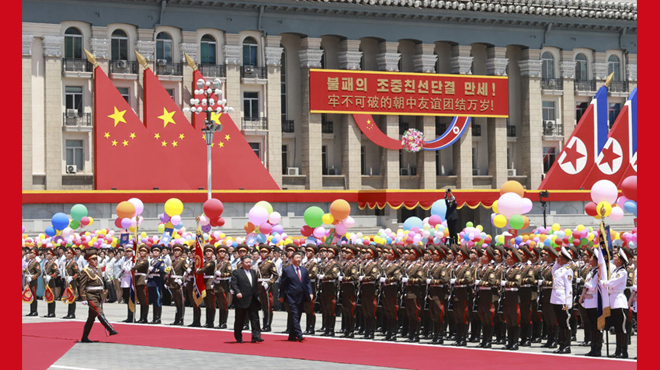 习近平出席金正恩举行的欢迎仪式